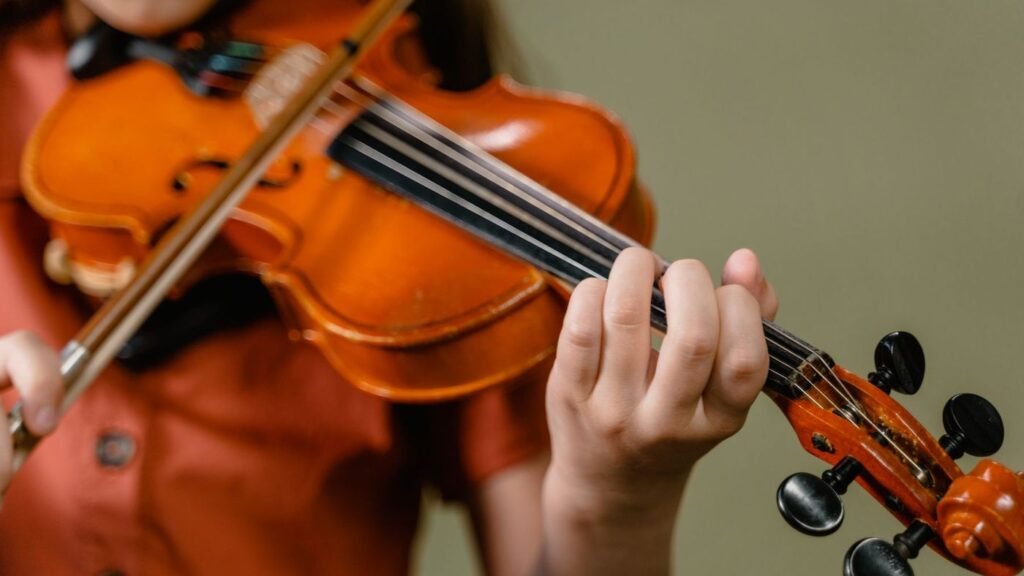 Close-up of a student playing the violin