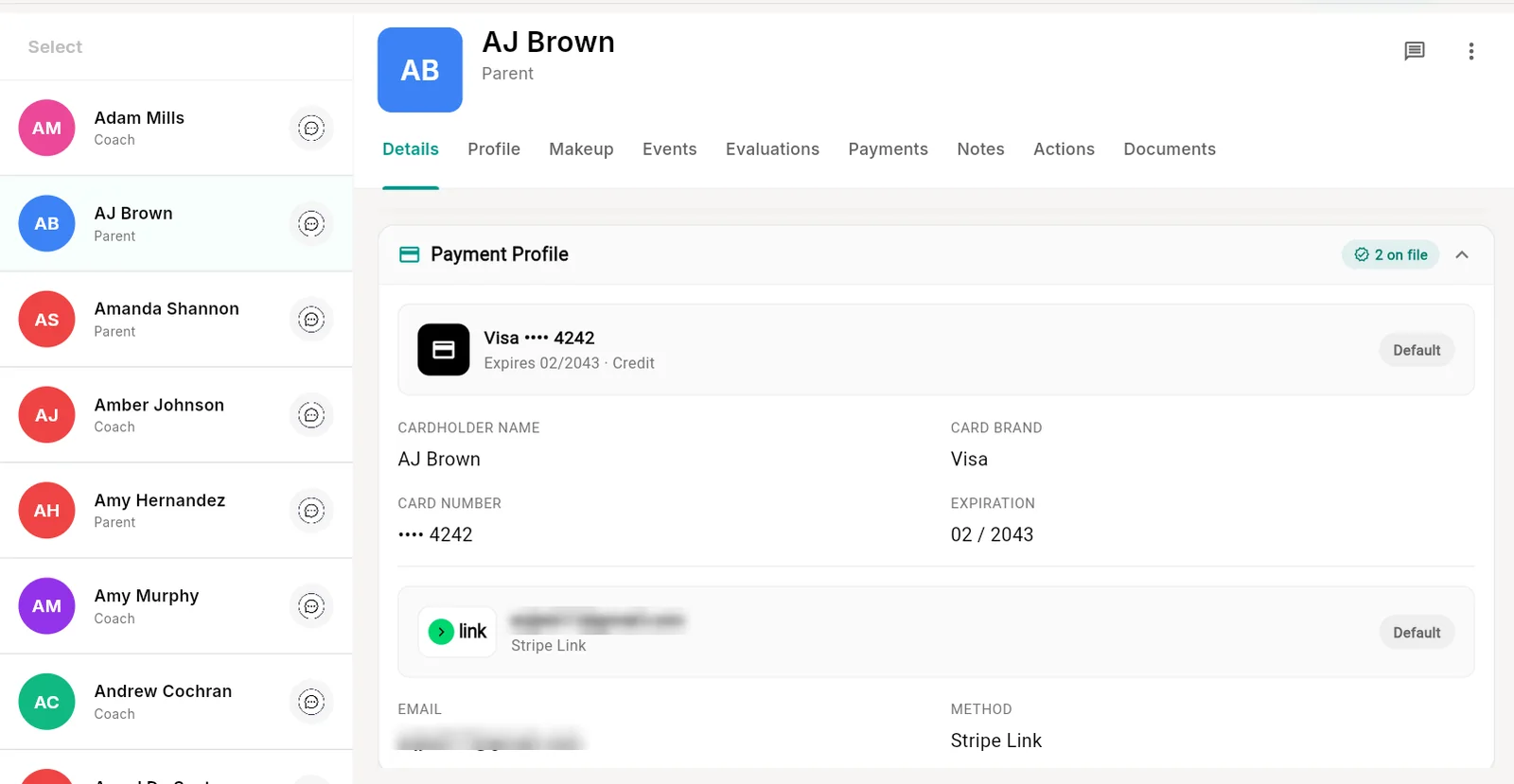Member payment profile in Outcoach showing a saved Visa card and a Stripe Link payment method