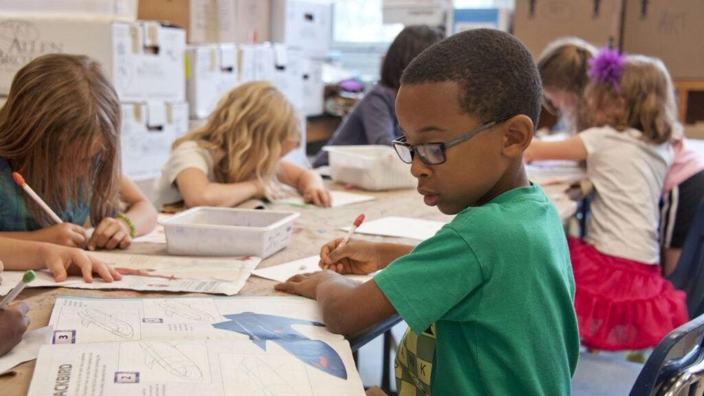 Children working together at a classroom table